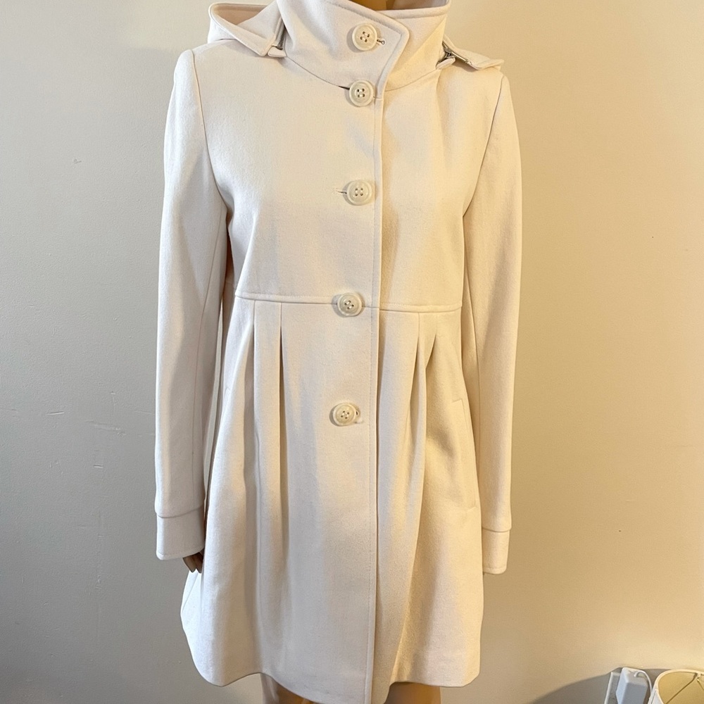 DKNY white coat size 12 60-% wool 30% polyester 10%viscose